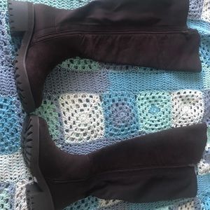 Brown over the knee boots. Wide calf with full length zipper.